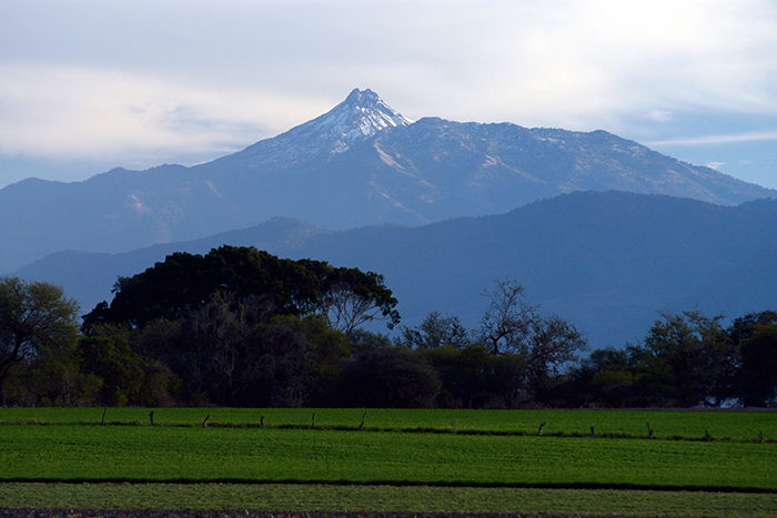 Fotografía de un paisaje que muestra el nevado de Colima